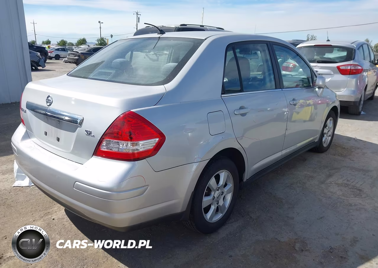 2009 Nissan Versa 1.8Sl VIN:3N1BC11E79L351975 - 4