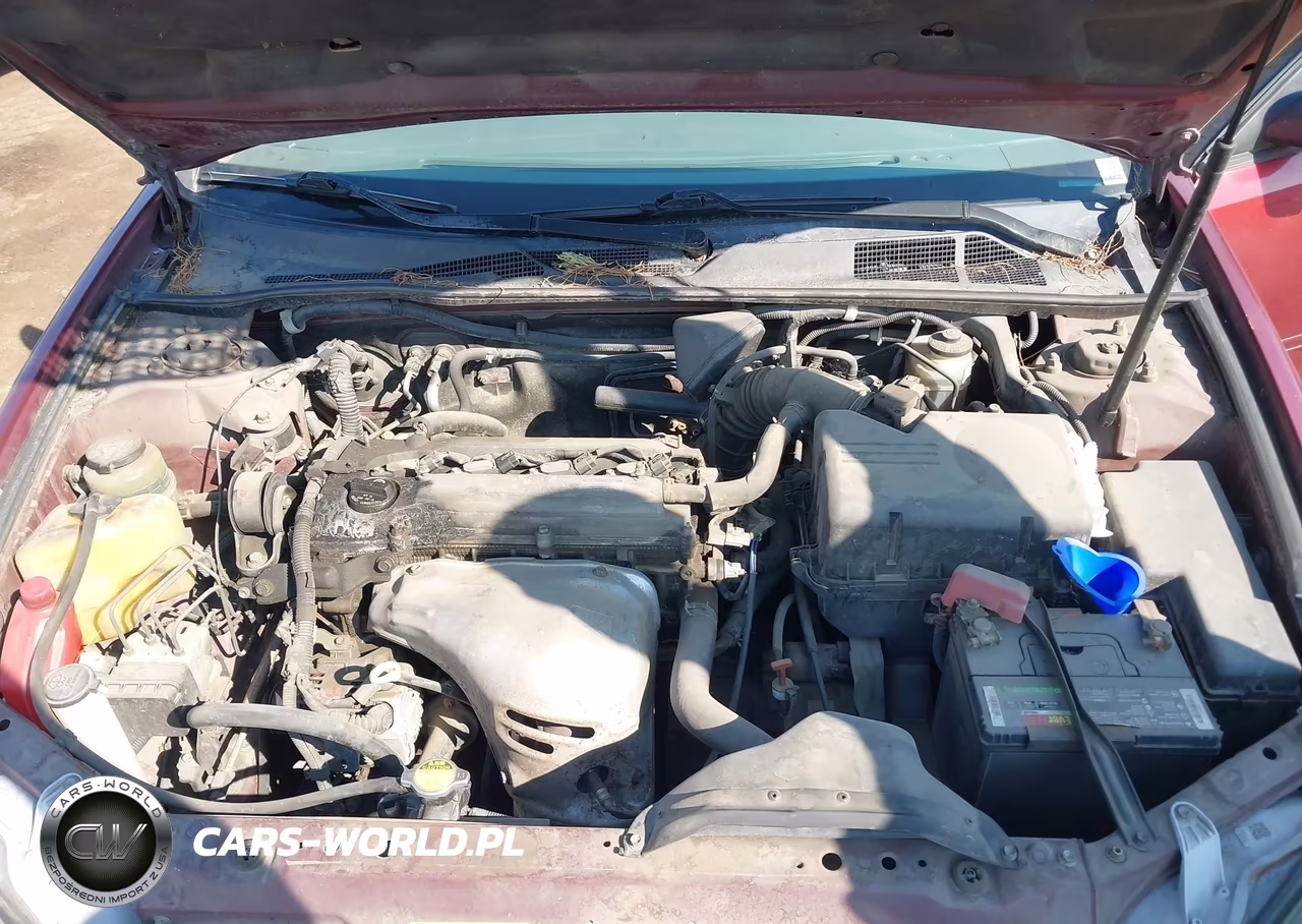 2002 Toyota Camry Le VIN:JTDBE32K520117635 - 10