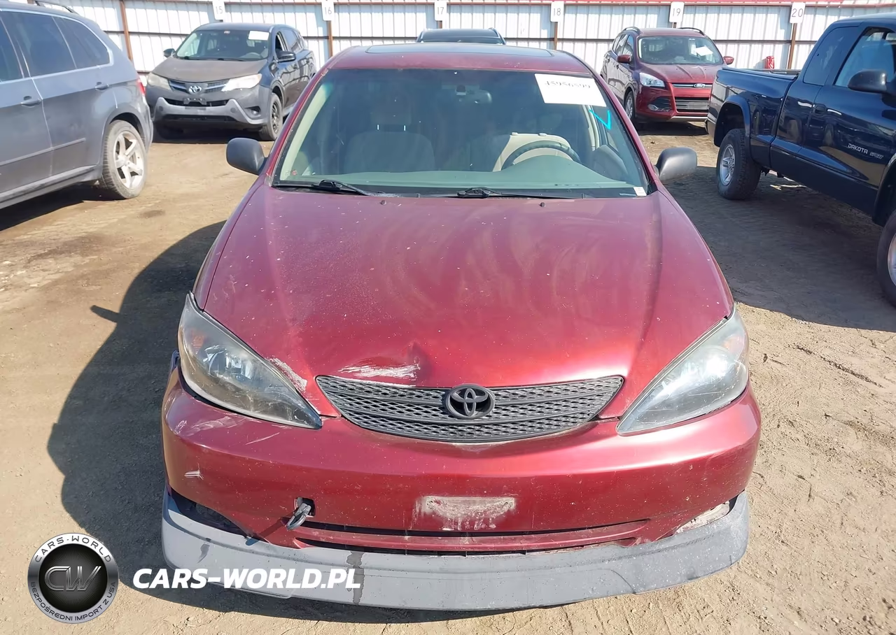 2002 Toyota Camry Le VIN:JTDBE32K520117635 - 12