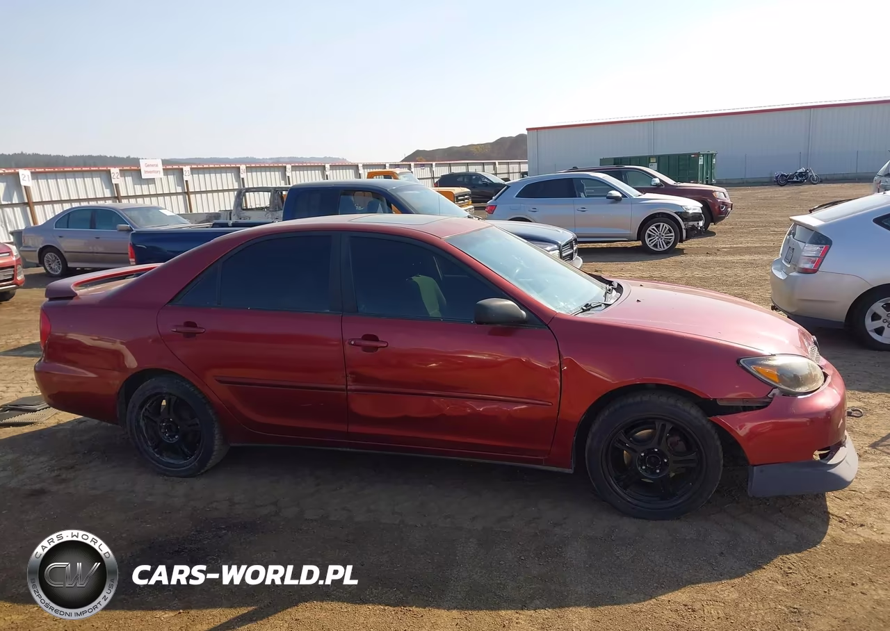 2002 Toyota Camry Le VIN:JTDBE32K520117635 - 13