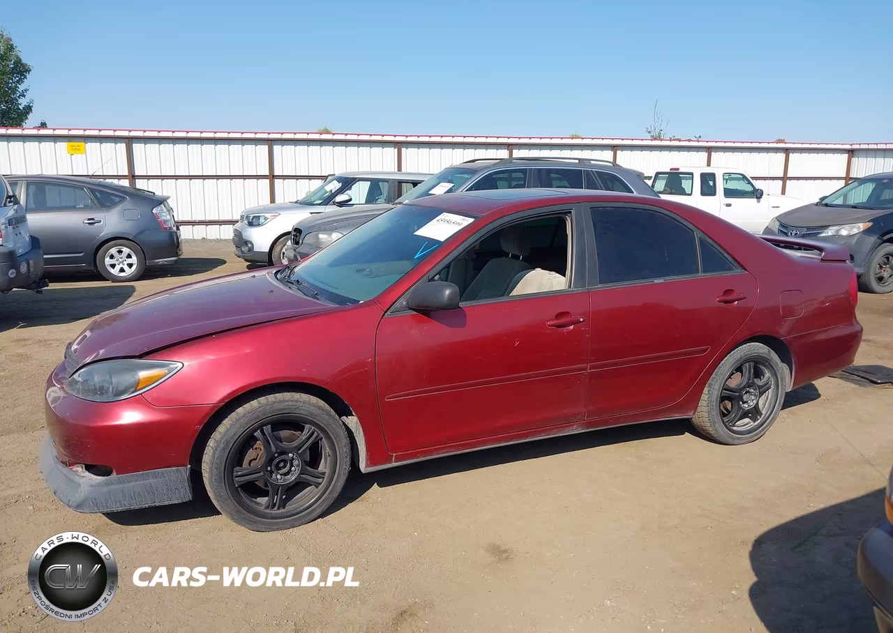2002 Toyota Camry Le VIN:JTDBE32K520117635 - 14