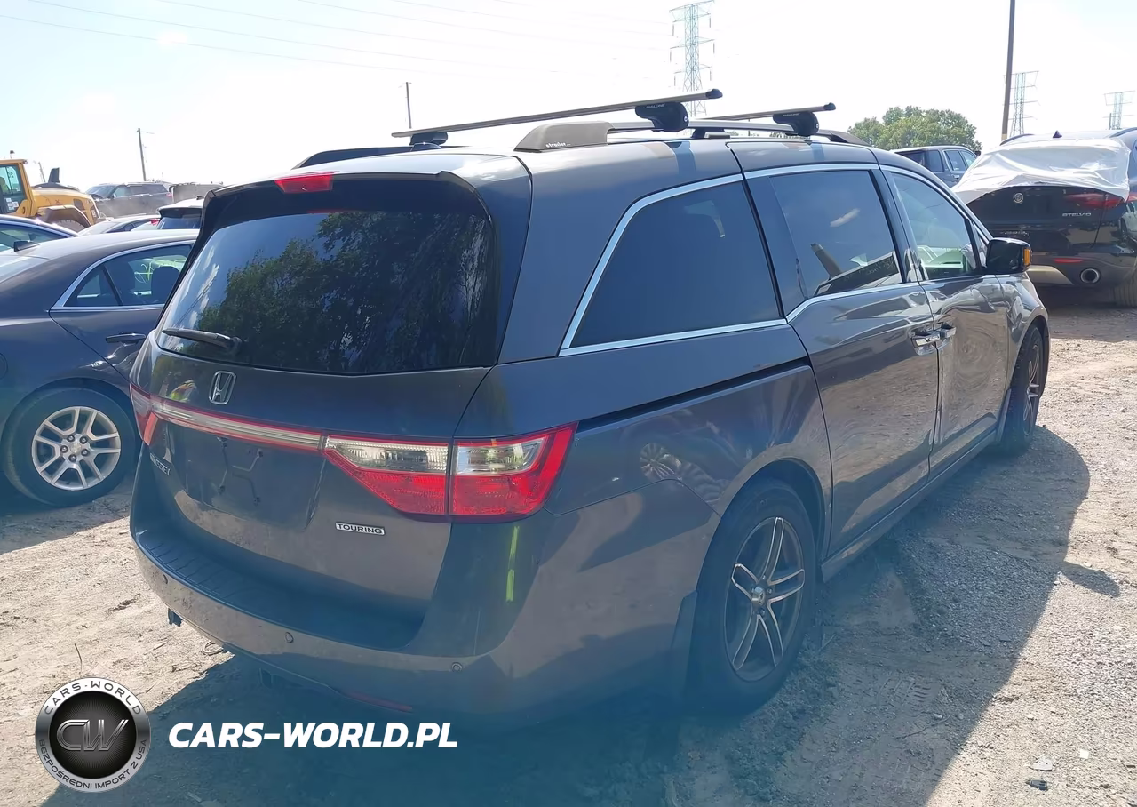 2011 Honda Odyssey Touring-Touring Elite VIN:5FNRL5H91BB047573 - 4