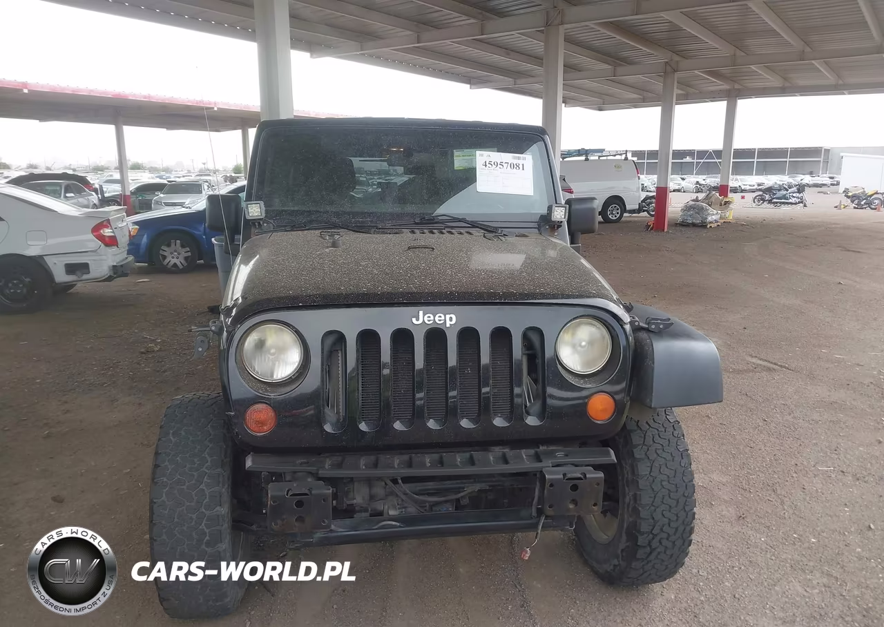 2011 Jeep Wrangler Unlimited Rubicon VIN:1J4BA6H12BL527328 - 12