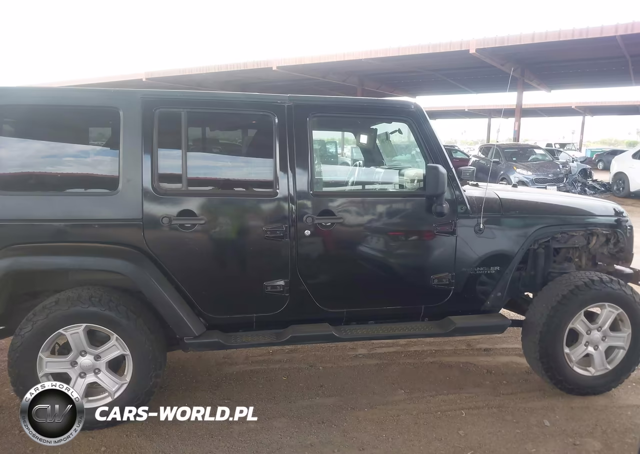 2011 Jeep Wrangler Unlimited Rubicon VIN:1J4BA6H12BL527328 - 13