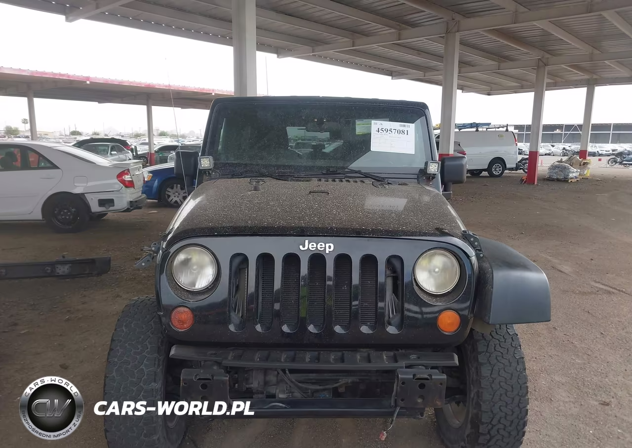 2011 Jeep Wrangler Unlimited Rubicon VIN:1J4BA6H12BL527328 - 6