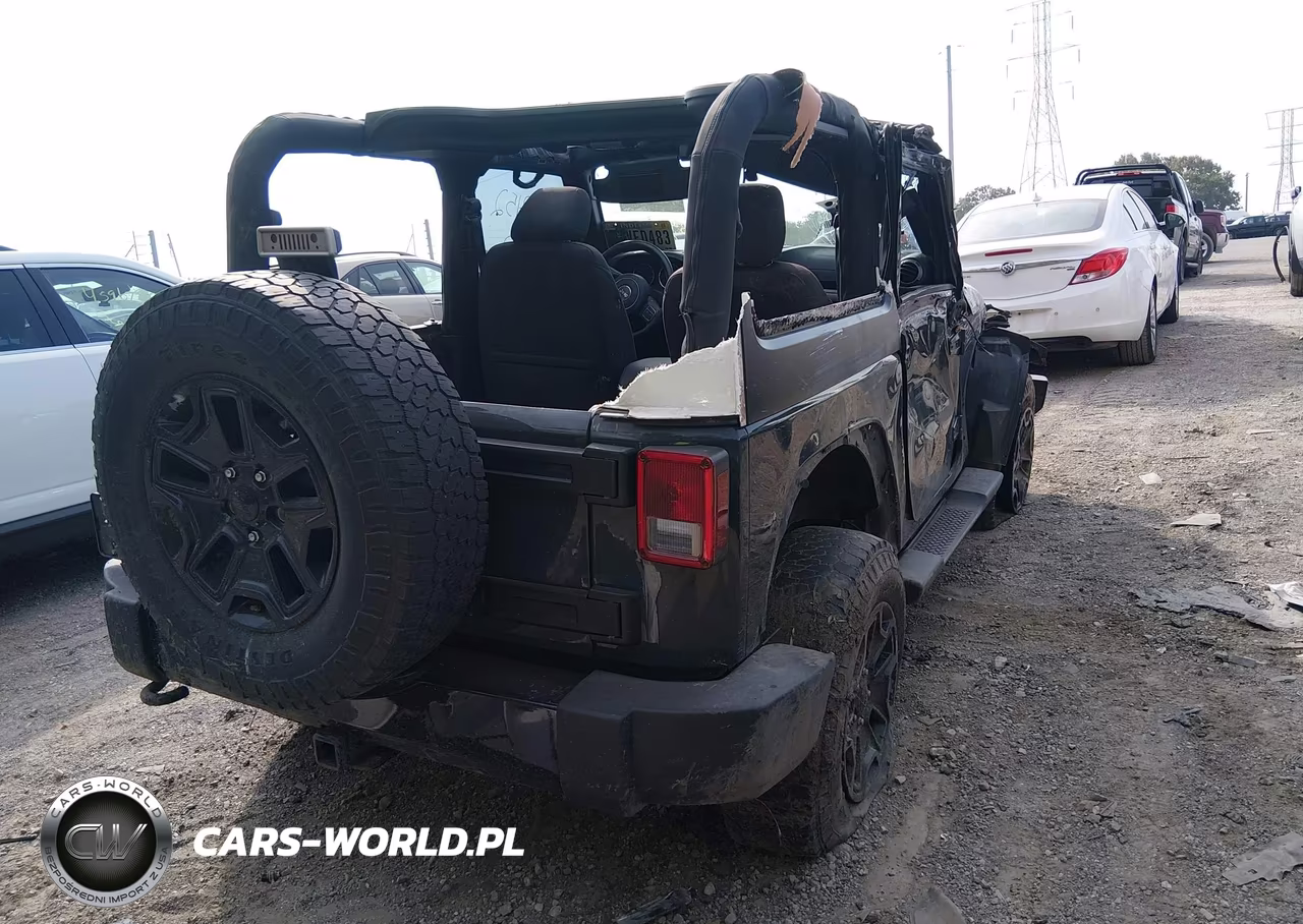 2017 Jeep Wrangler Willys Wheeler VIN:1C4AJWAG0HL712437 - 4