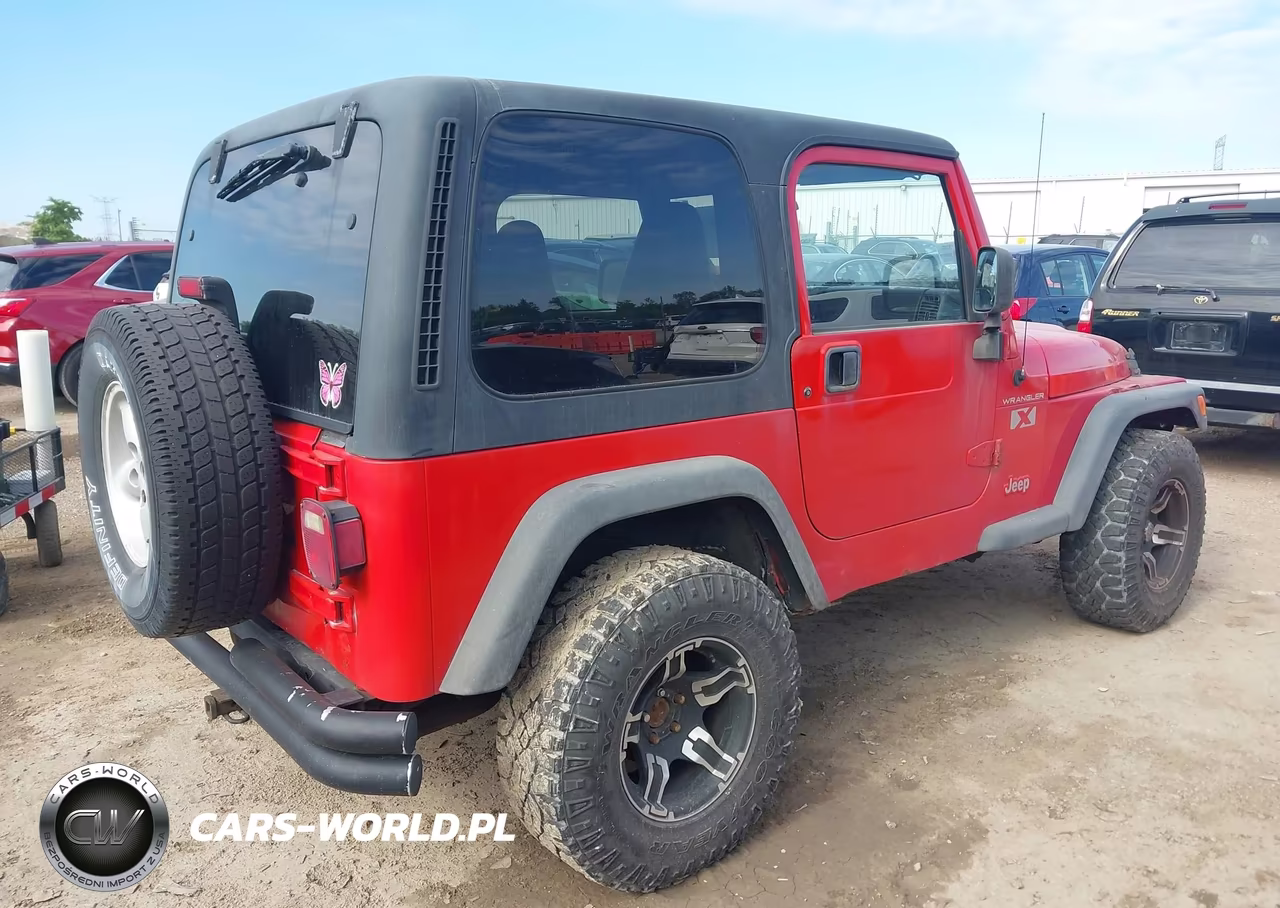 1999 Jeep Wrangler Sport VIN:1J4FY19S4XP495375 - 4