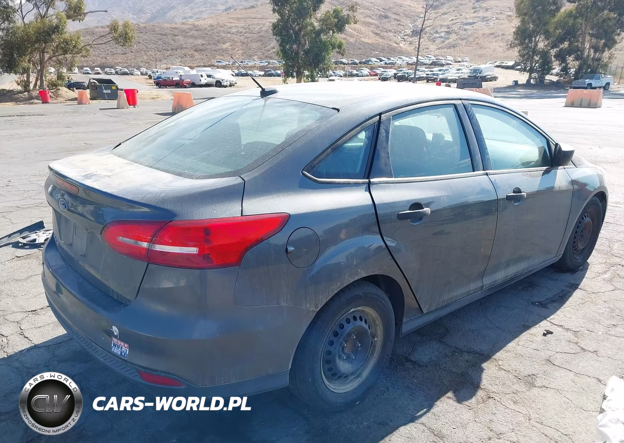 2017 Ford Focus S VIN:1FADP3E29HL236042 - 4
