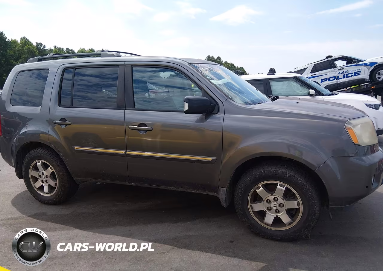 2011 Honda Pilot Touring VIN:5FNYF3H96BB042571 - 13
