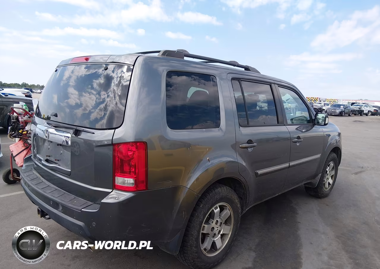 2011 Honda Pilot Touring VIN:5FNYF3H96BB042571 - 4
