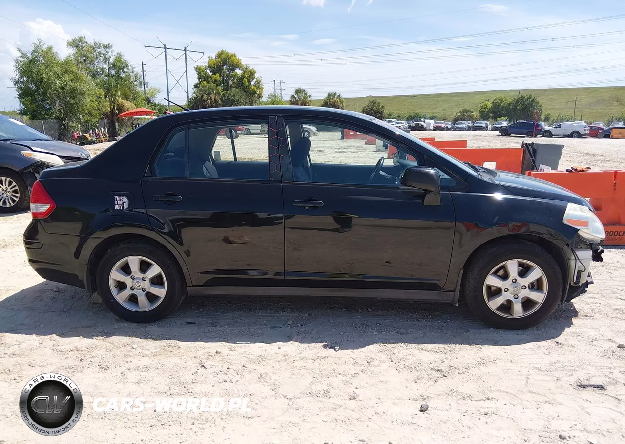2009 Nissan Versa 1.8Sl VIN:3N1BC11E89L496992 - 14