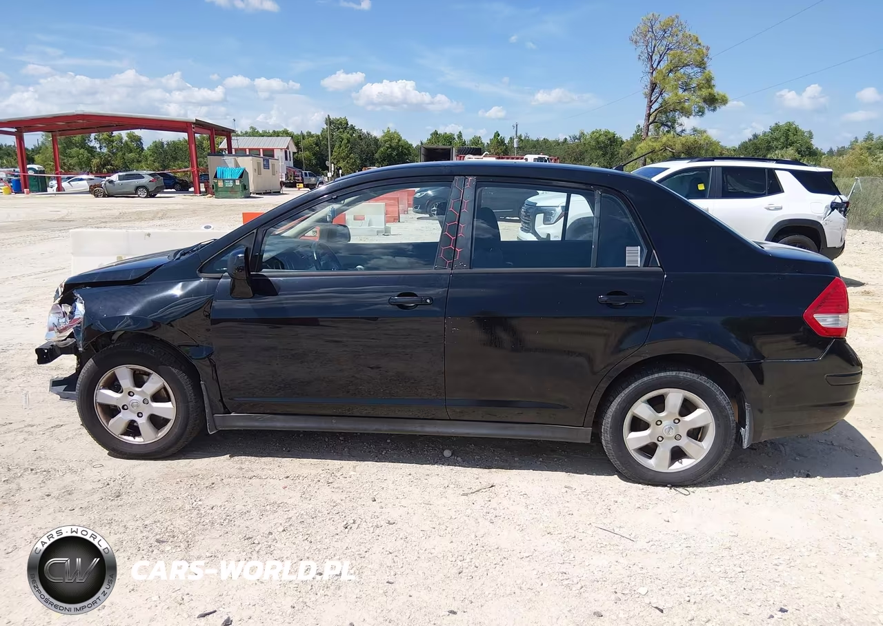 2009 Nissan Versa 1.8Sl VIN:3N1BC11E89L496992 - 15