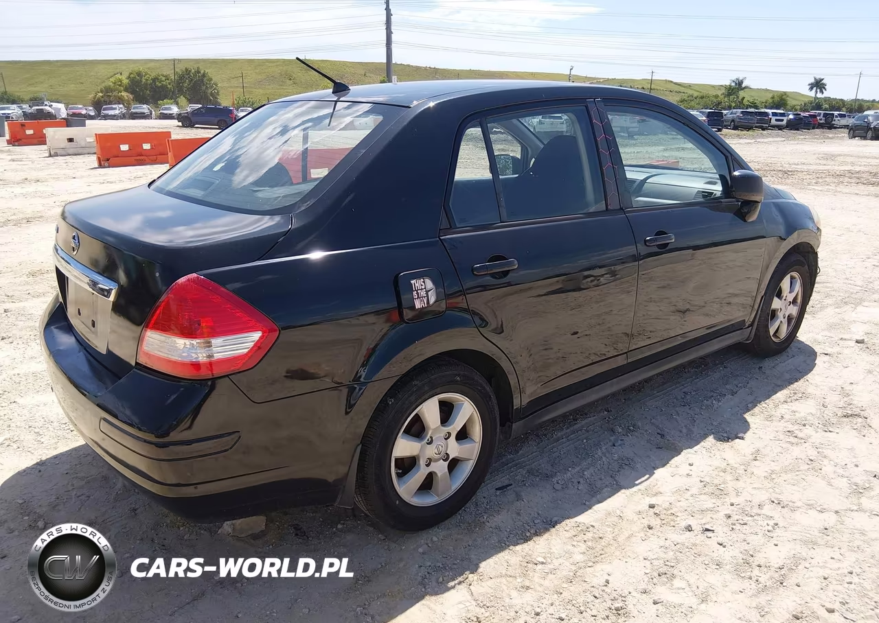 2009 Nissan Versa 1.8Sl VIN:3N1BC11E89L496992 - 4