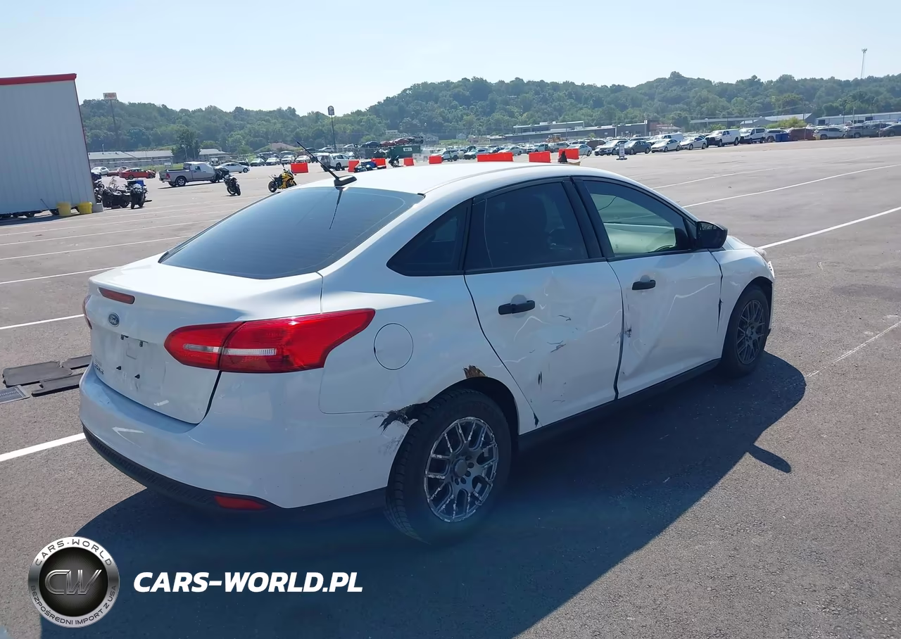 2017 Ford Focus S VIN:1FADP3E29HL257943 - 4