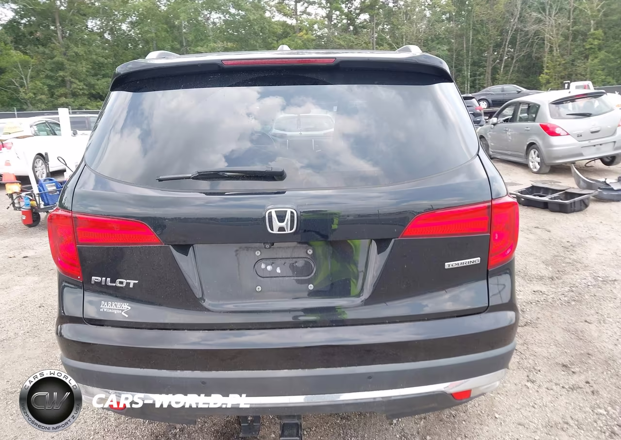 2016 Honda Pilot Touring VIN:5FNYF5H99GB056080 - 16