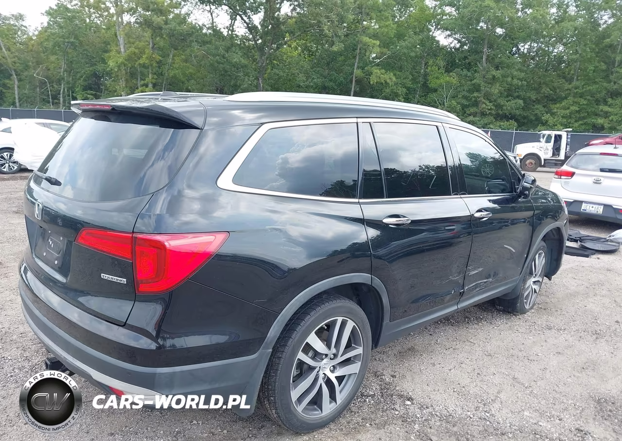 2016 Honda Pilot Touring VIN:5FNYF5H99GB056080 - 4