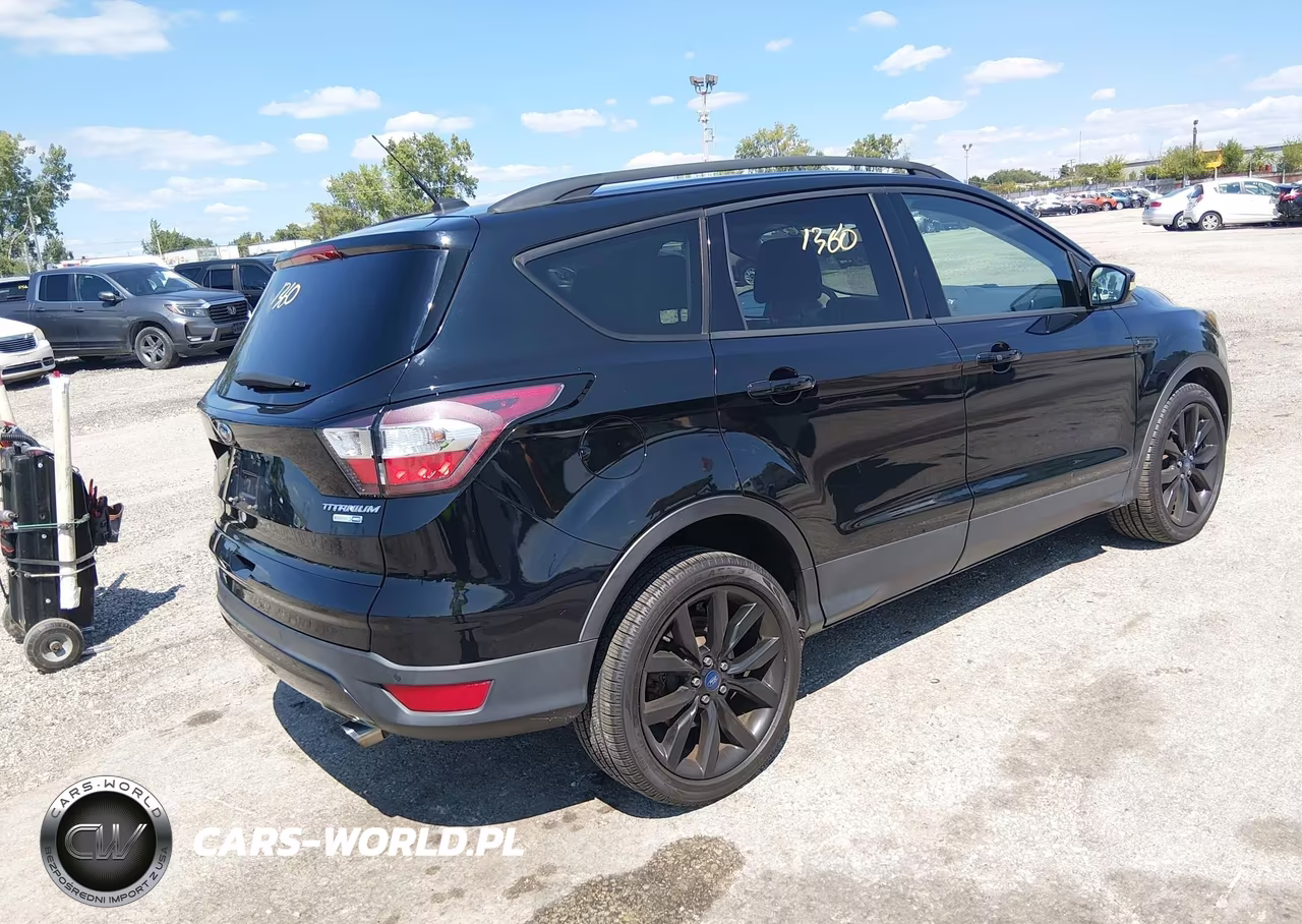 2017 Ford Escape Titanium VIN:1FMCU9JD6HUE66877 - 4