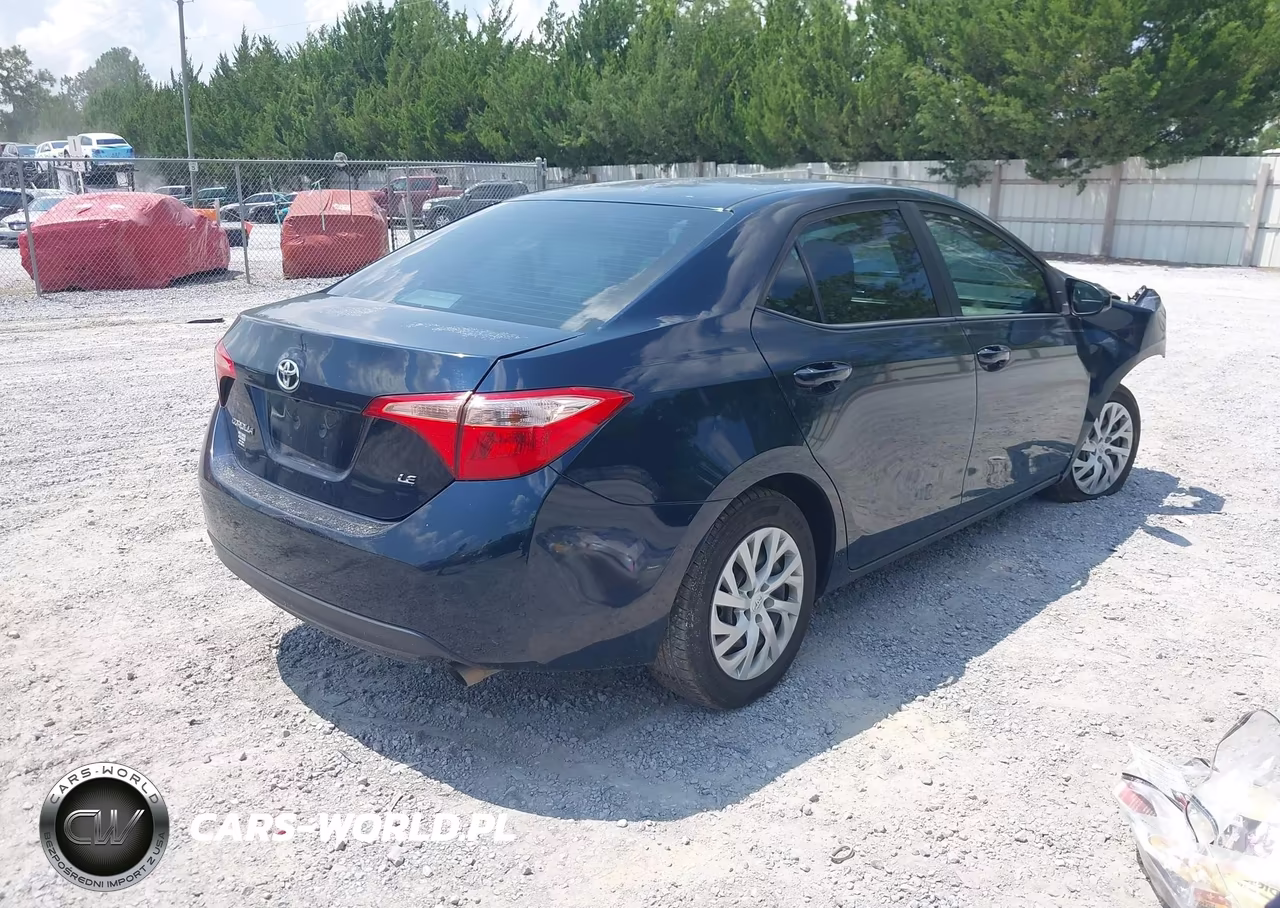 2018 Toyota Corolla Le VIN:5YFBURHE4JP831557 - 4
