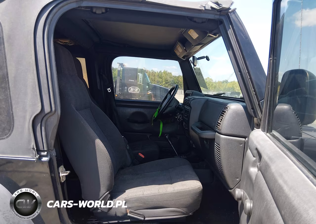 2004 Jeep Wrangler Rubicon VIN:1J4FA69S14P761710 - 5