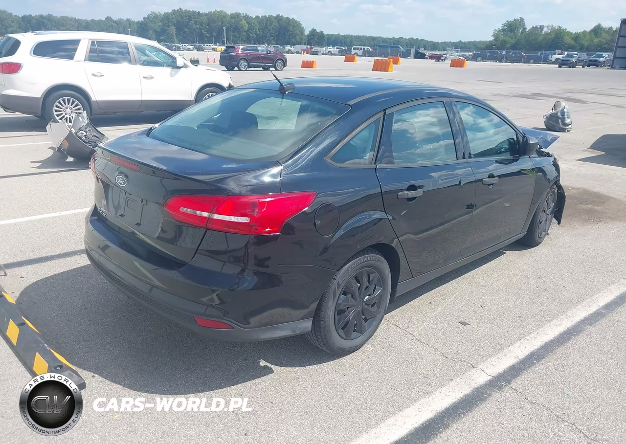 2017 Ford Focus S VIN:1FADP3E29HL257246 - 4