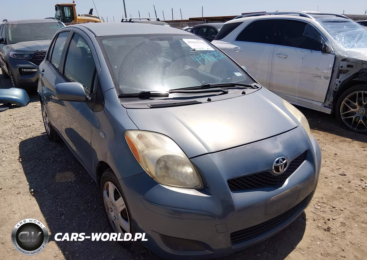 2009 Toyota Yaris VIN:JTDKT903X95241126 - 1