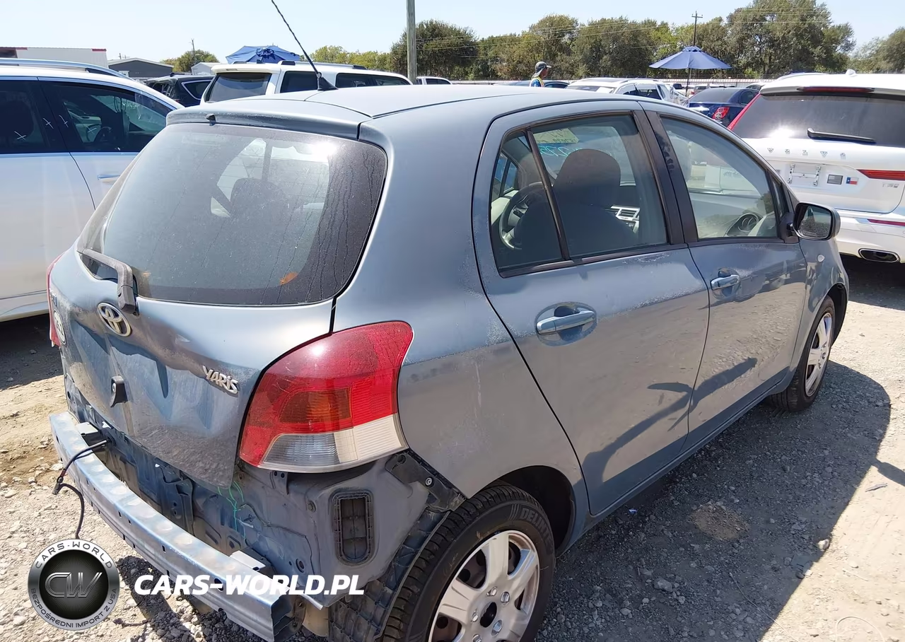 2009 Toyota Yaris VIN:JTDKT903X95241126 - 4