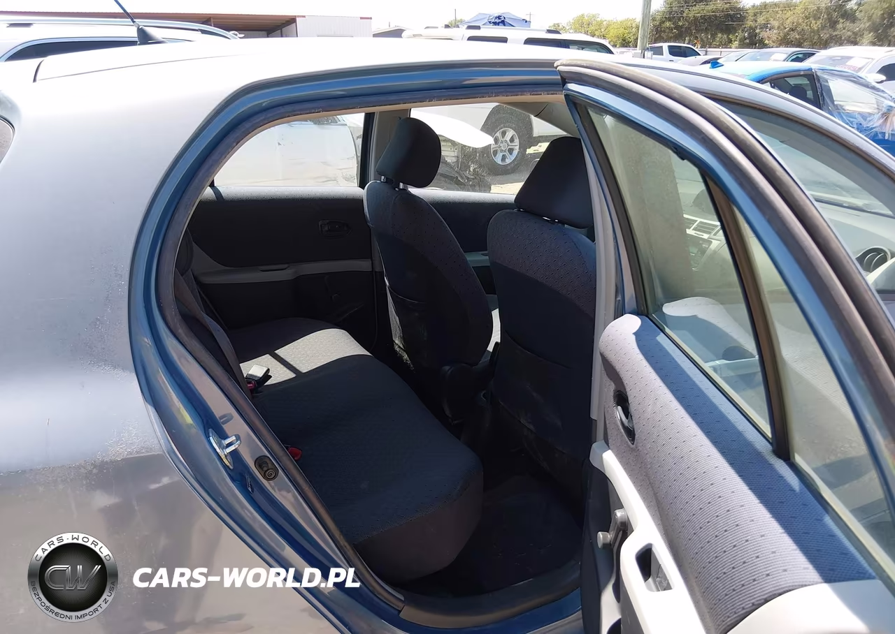 2009 Toyota Yaris VIN:JTDKT903X95241126 - 8