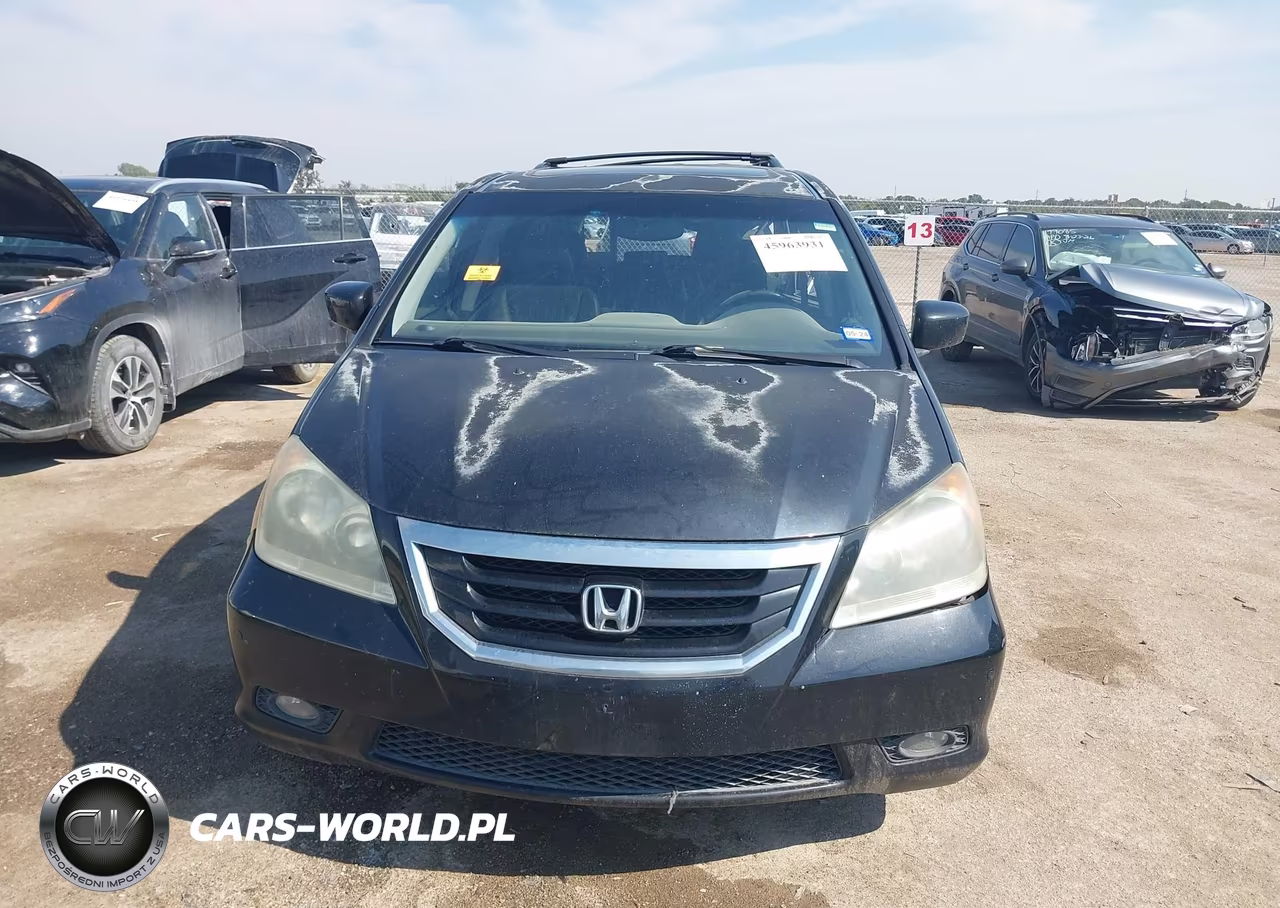 2010 Honda Odyssey Touring VIN:5FNRL3H91AB022305 - 11