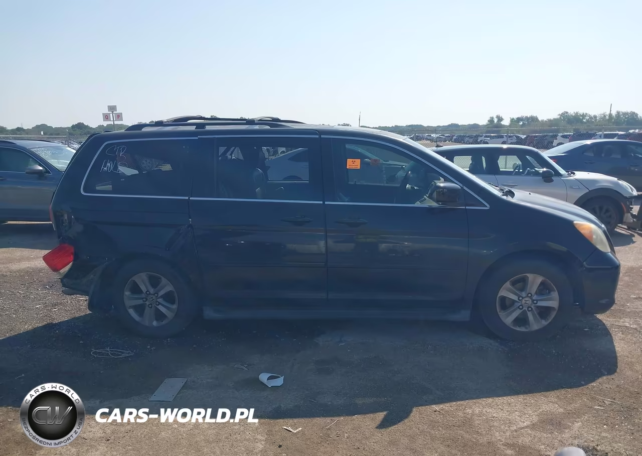 2010 Honda Odyssey Touring VIN:5FNRL3H91AB022305 - 12