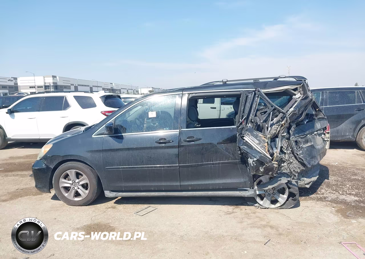 2010 Honda Odyssey Touring VIN:5FNRL3H91AB022305 - 13