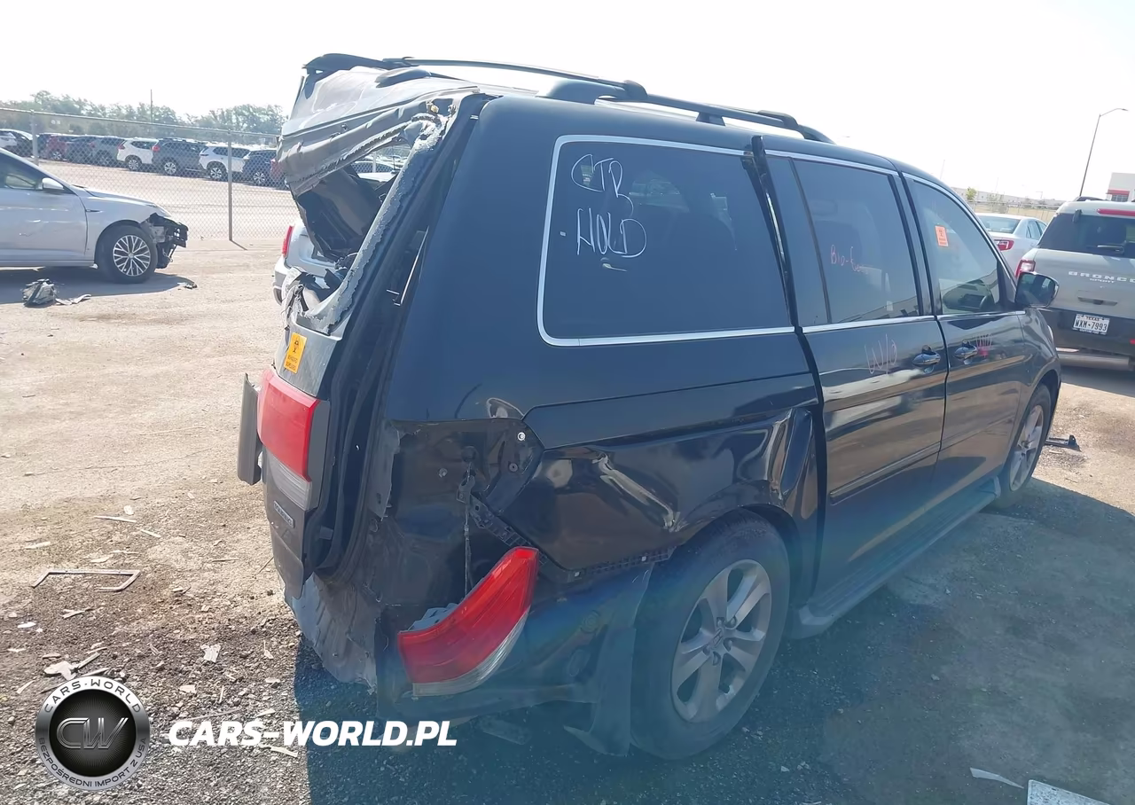 2010 Honda Odyssey Touring VIN:5FNRL3H91AB022305 - 4