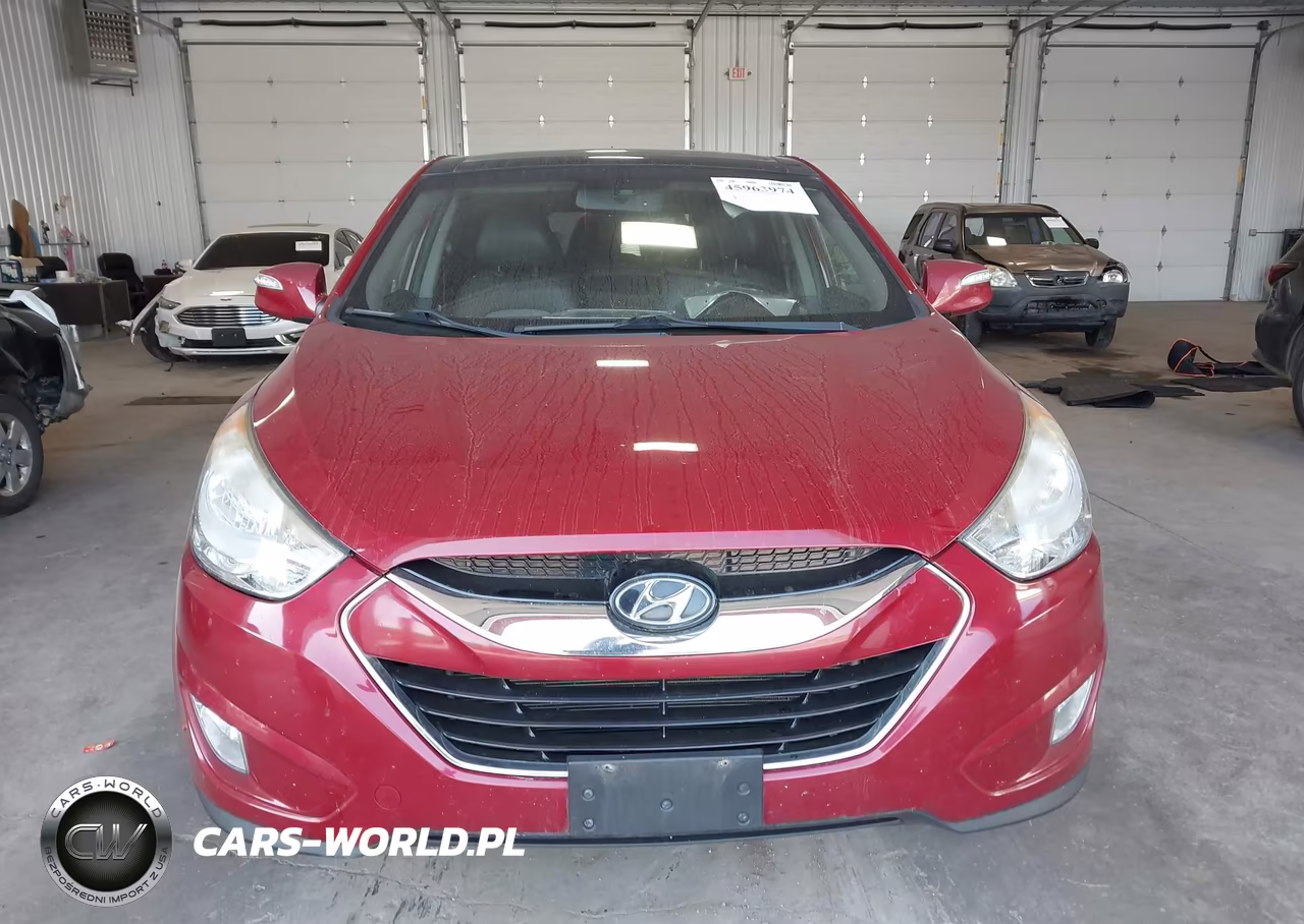 2012 Hyundai Tucson Limited VIN:KM8JU3AC6CU403704 - 12