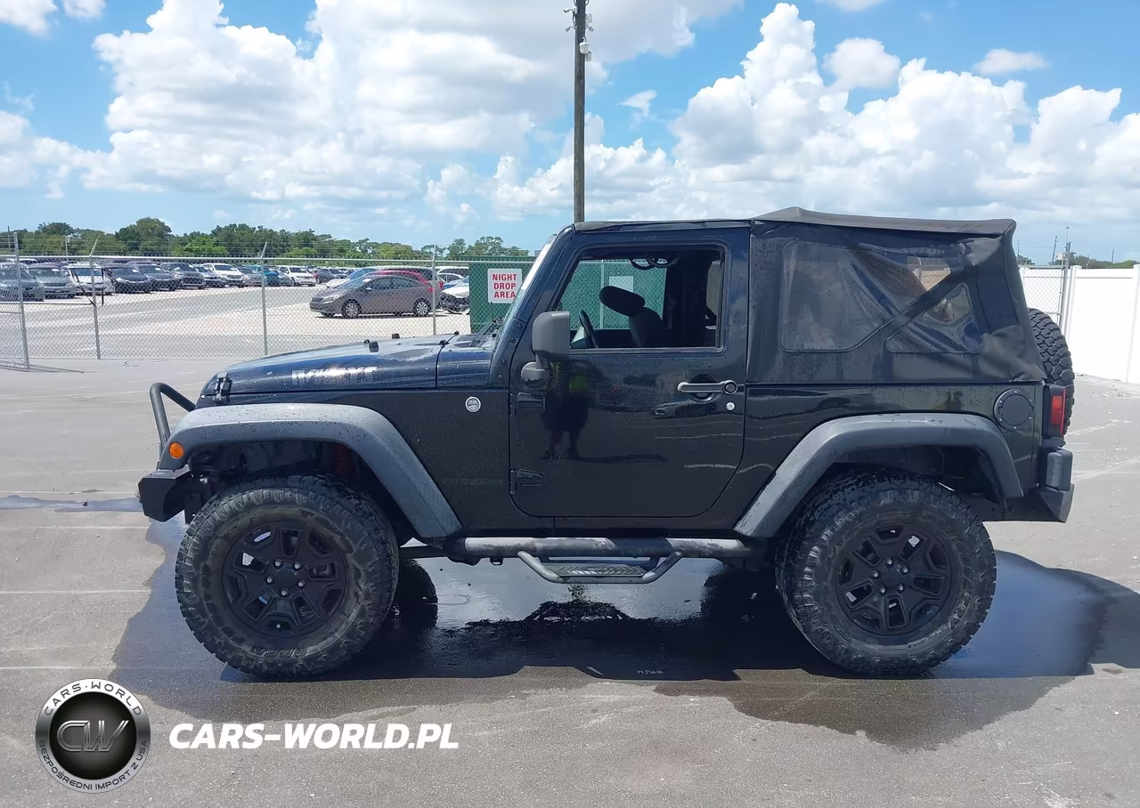 2014 Jeep Wrangler Willys Wheeler VIN:1C4AJWAG9EL223904 - 14