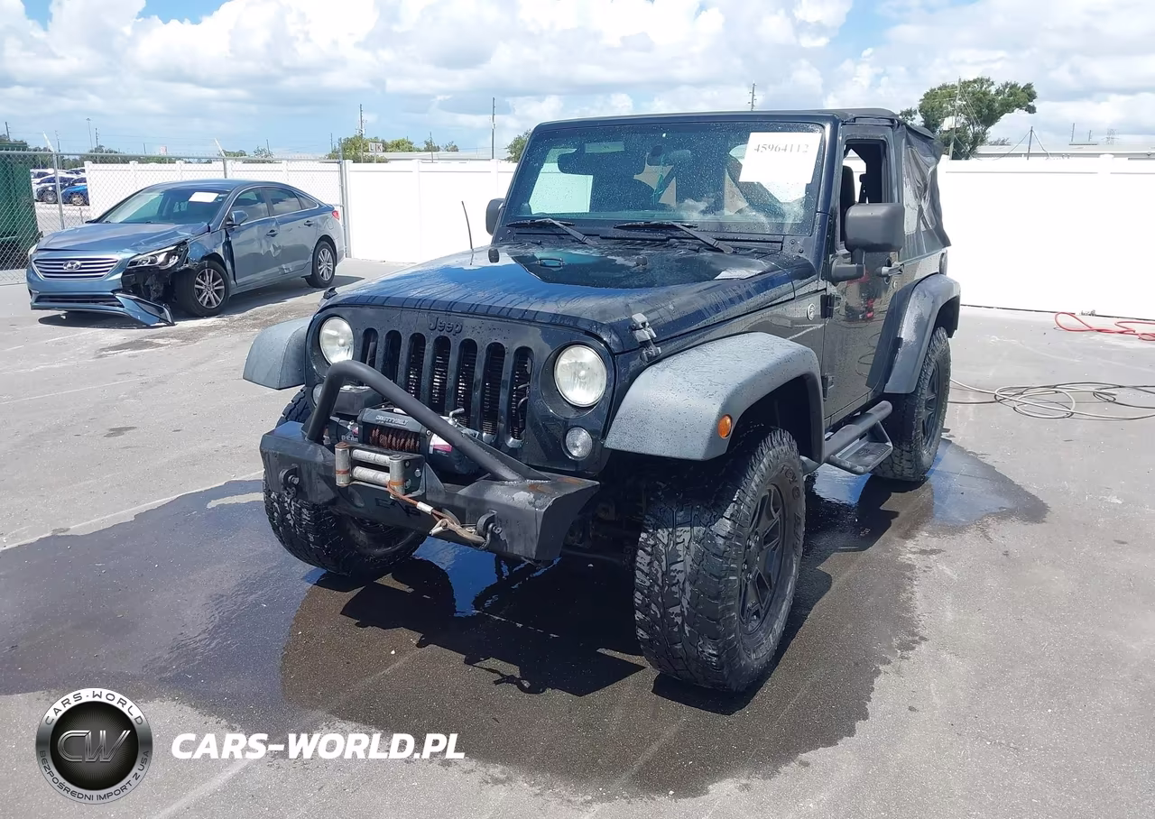 2014 Jeep Wrangler Willys Wheeler VIN:1C4AJWAG9EL223904 - 2