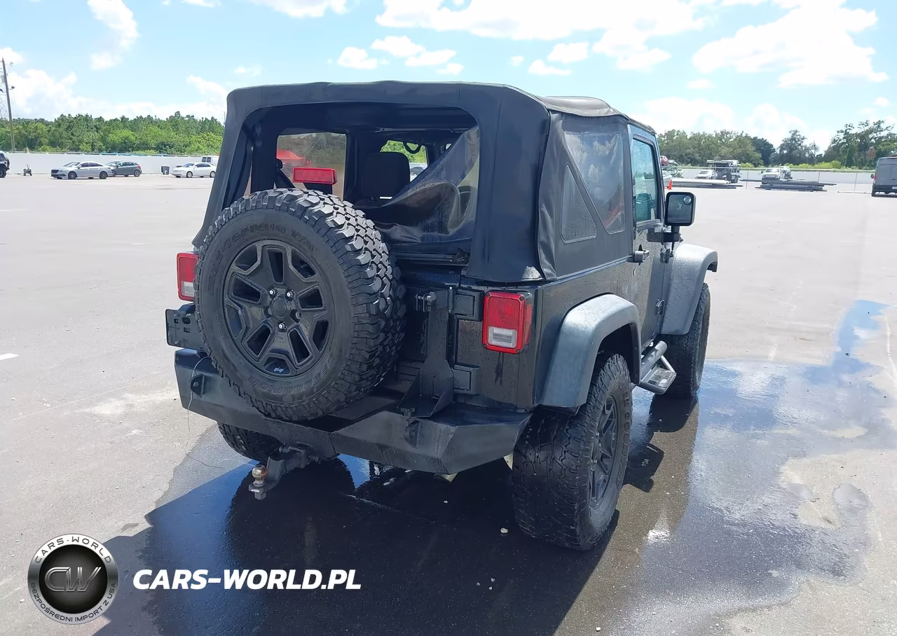 2014 Jeep Wrangler Willys Wheeler VIN:1C4AJWAG9EL223904 - 4