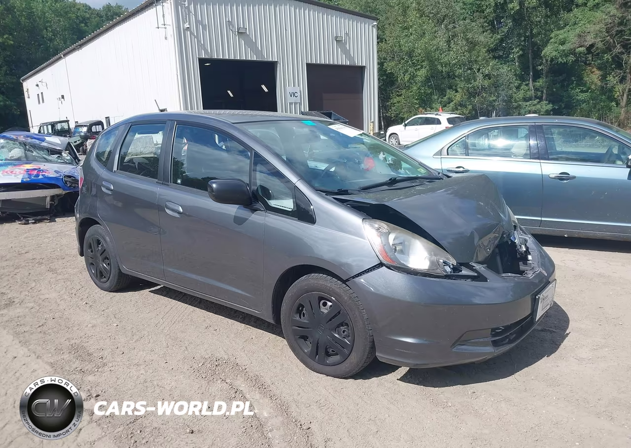 2011 Honda Fit VIN:JHMGE8H38BS007409 - 1
