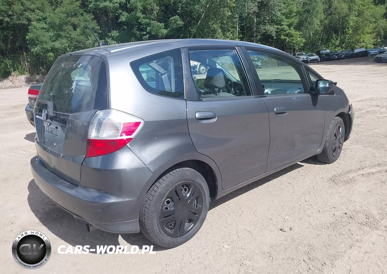 2011 Honda Fit VIN:JHMGE8H38BS007409 - 4