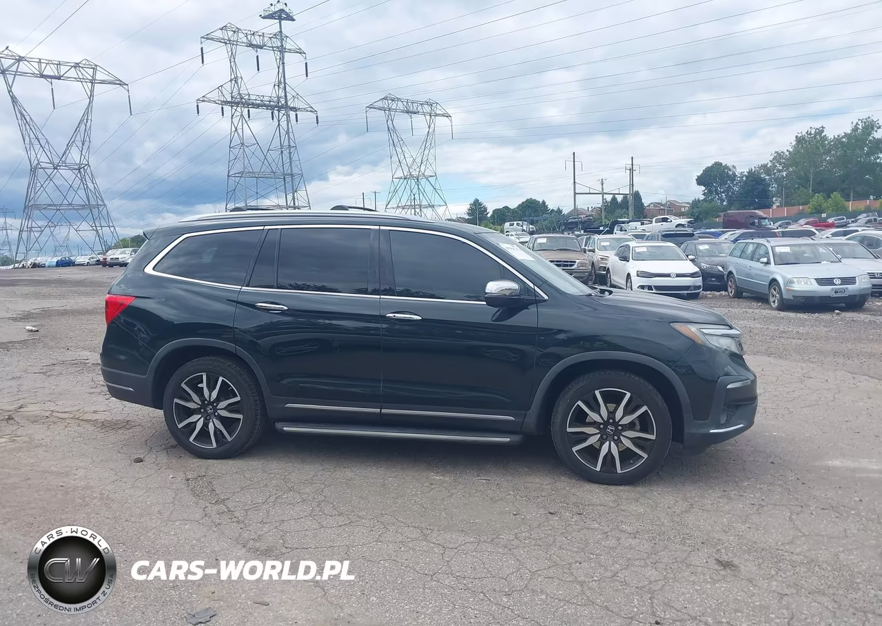 2019 Honda Pilot Elite VIN:5FNYF6H0XKB019801 - 13