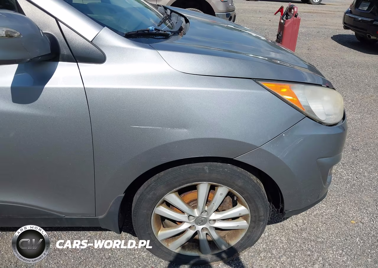 2011 Hyundai Tucson Limited VIN:KM8JUCAC5BU170705 - 12