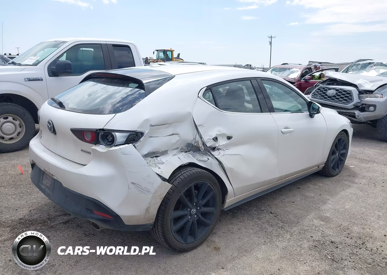 2019 Mazda Mazda3 Premium Package VIN:JM1BPBNM8K1145053 - 4