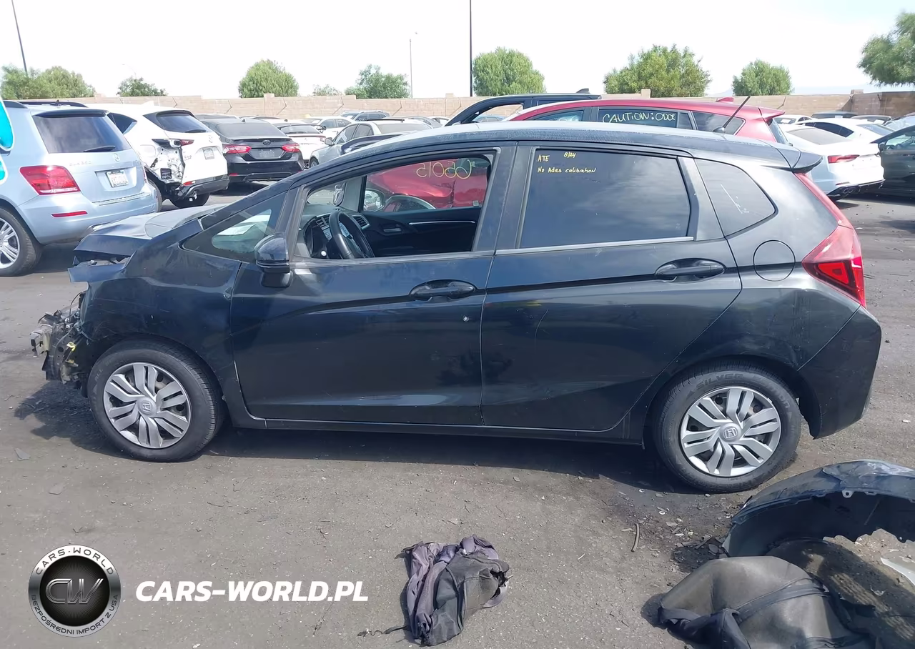 2015 Honda Fit Lx VIN:3HGGK5G58FM773765 - 15