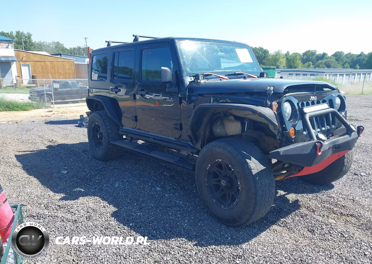 2011 Jeep Wrangler Unlimited Rubicon VIN:1J4BA6H10BL551403 - 1