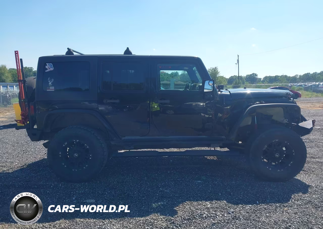 2011 Jeep Wrangler Unlimited Rubicon VIN:1J4BA6H10BL551403 - 13