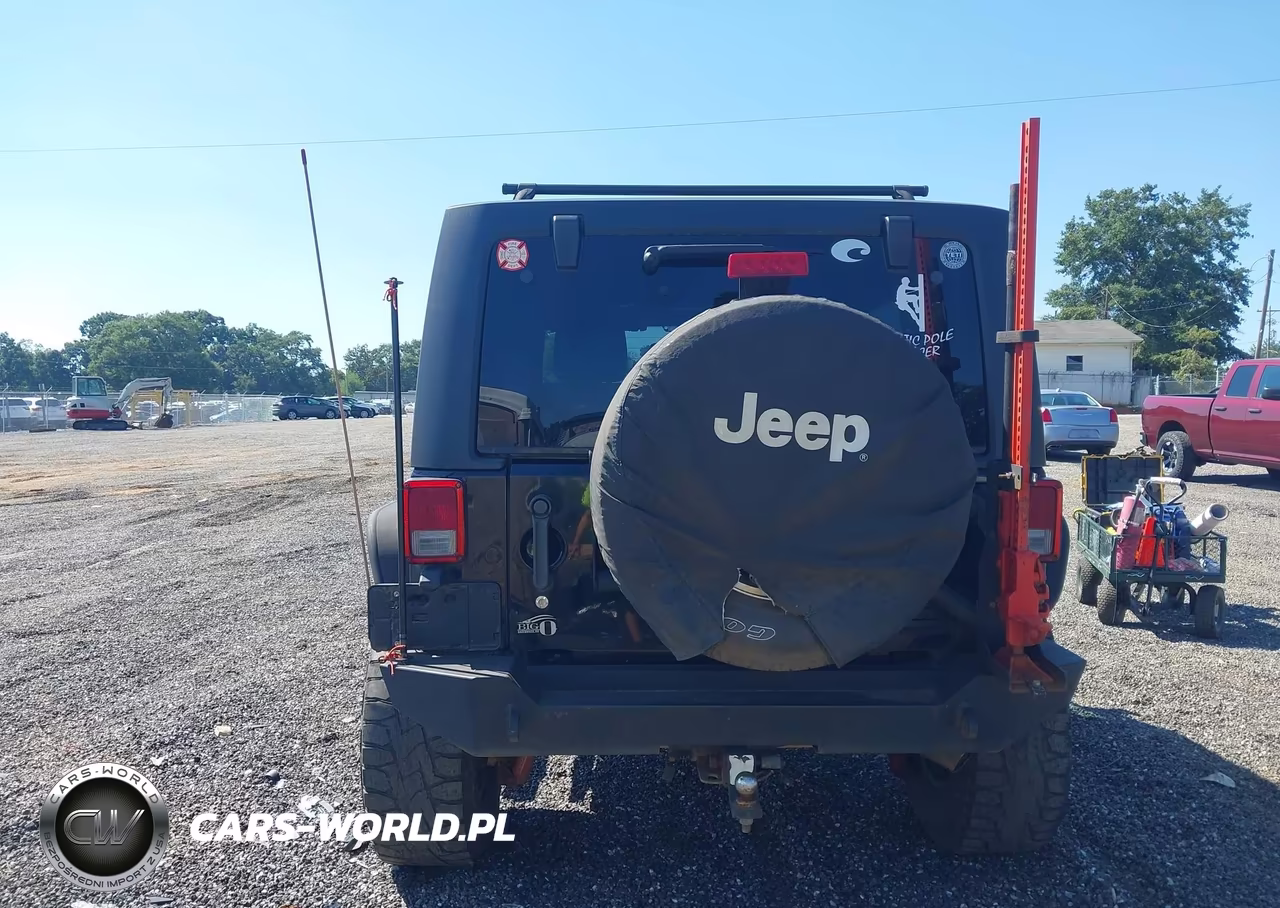 2011 Jeep Wrangler Unlimited Rubicon VIN:1J4BA6H10BL551403 - 16