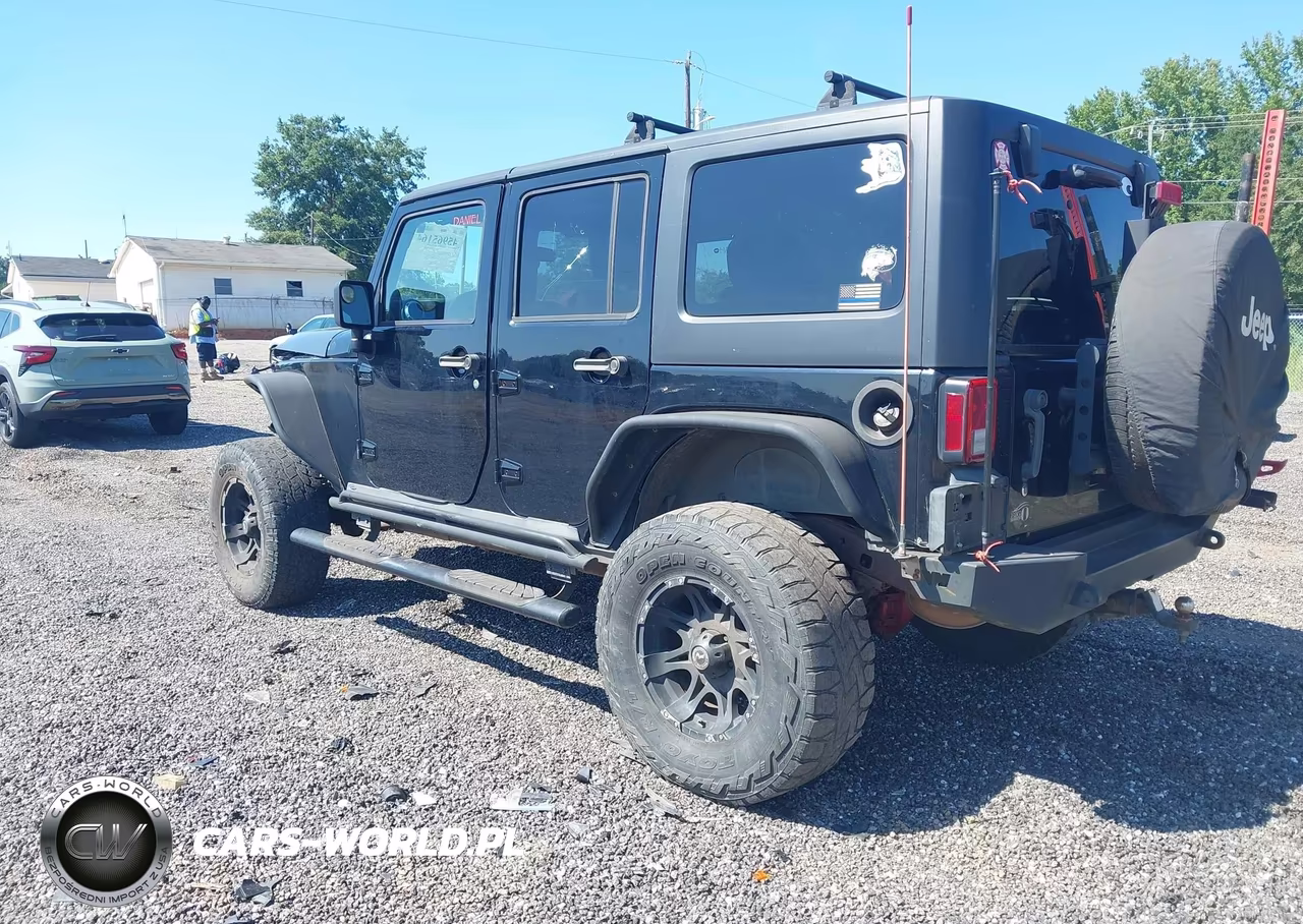 2011 Jeep Wrangler Unlimited Rubicon VIN:1J4BA6H10BL551403 - 3