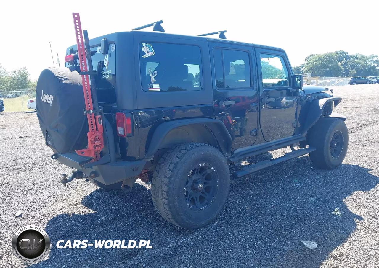 2011 Jeep Wrangler Unlimited Rubicon VIN:1J4BA6H10BL551403 - 4