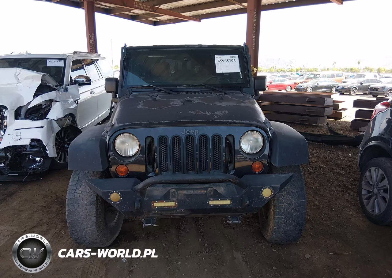 2011 Jeep Wrangler Unlimited Rubicon VIN:1J4BA6H16BL534413 - 12