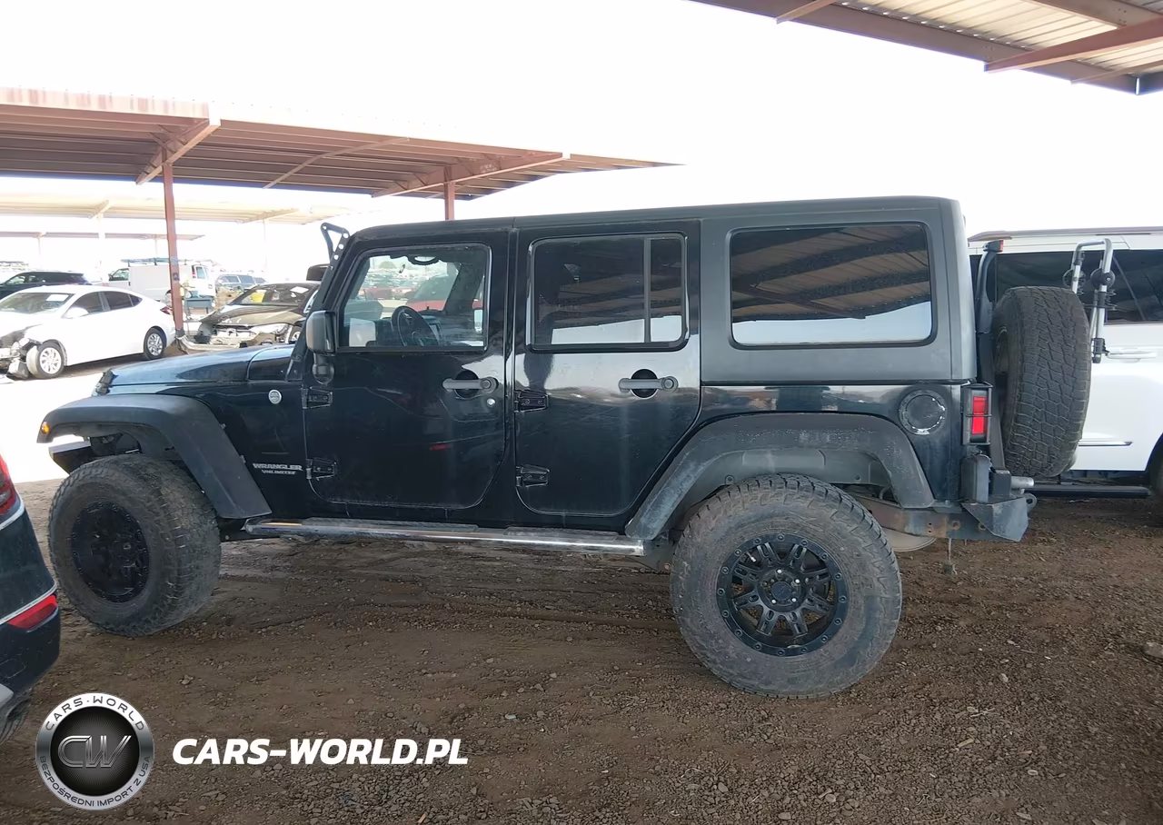 2011 Jeep Wrangler Unlimited Rubicon VIN:1J4BA6H16BL534413 - 14