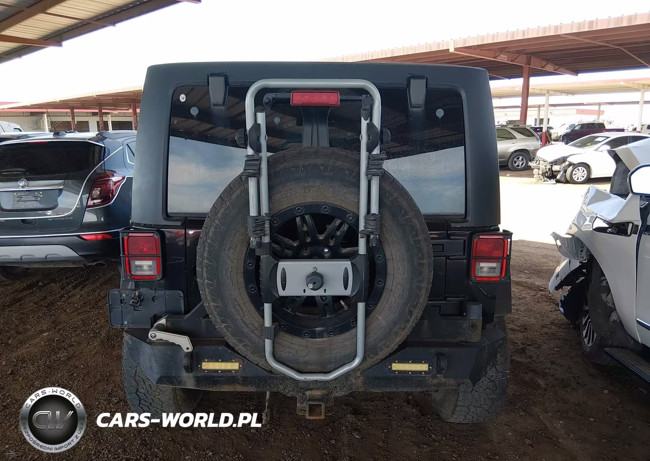 2011 Jeep Wrangler Unlimited Rubicon VIN:1J4BA6H16BL534413 - 16