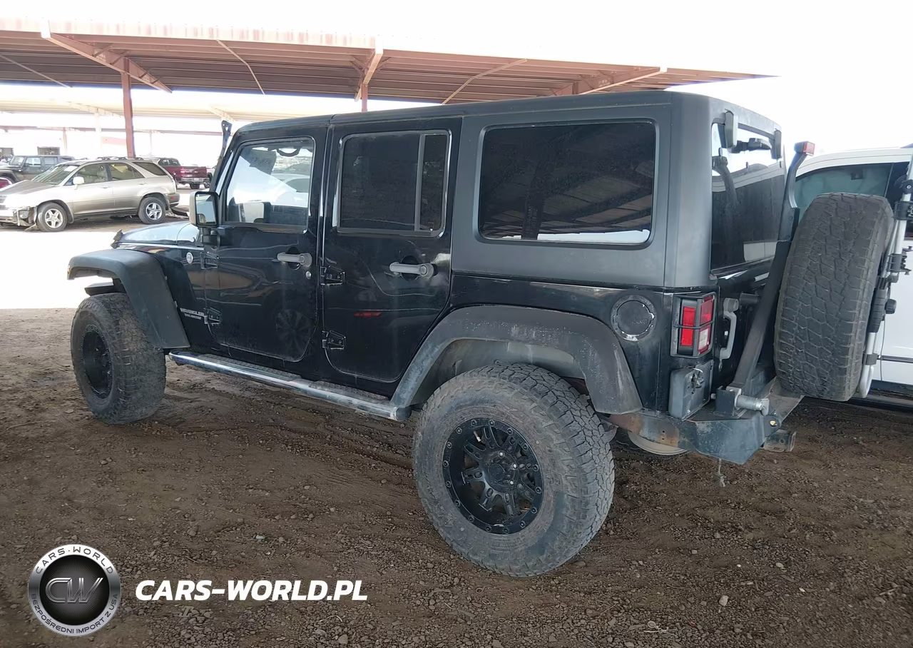 2011 Jeep Wrangler Unlimited Rubicon VIN:1J4BA6H16BL534413 - 3